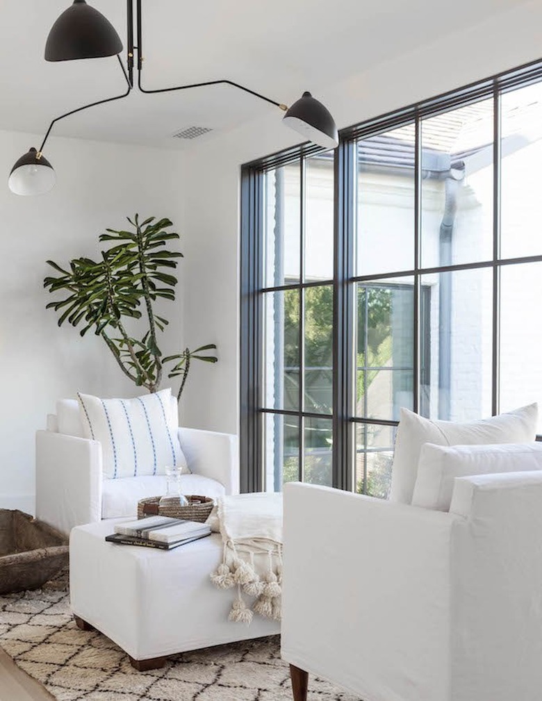 A large window and neutral living room