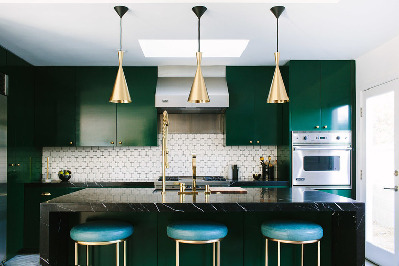 midcentury kitchen with geometric tile backsplash