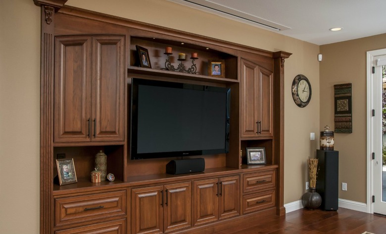 large flat screen tv in built-in entertainment center