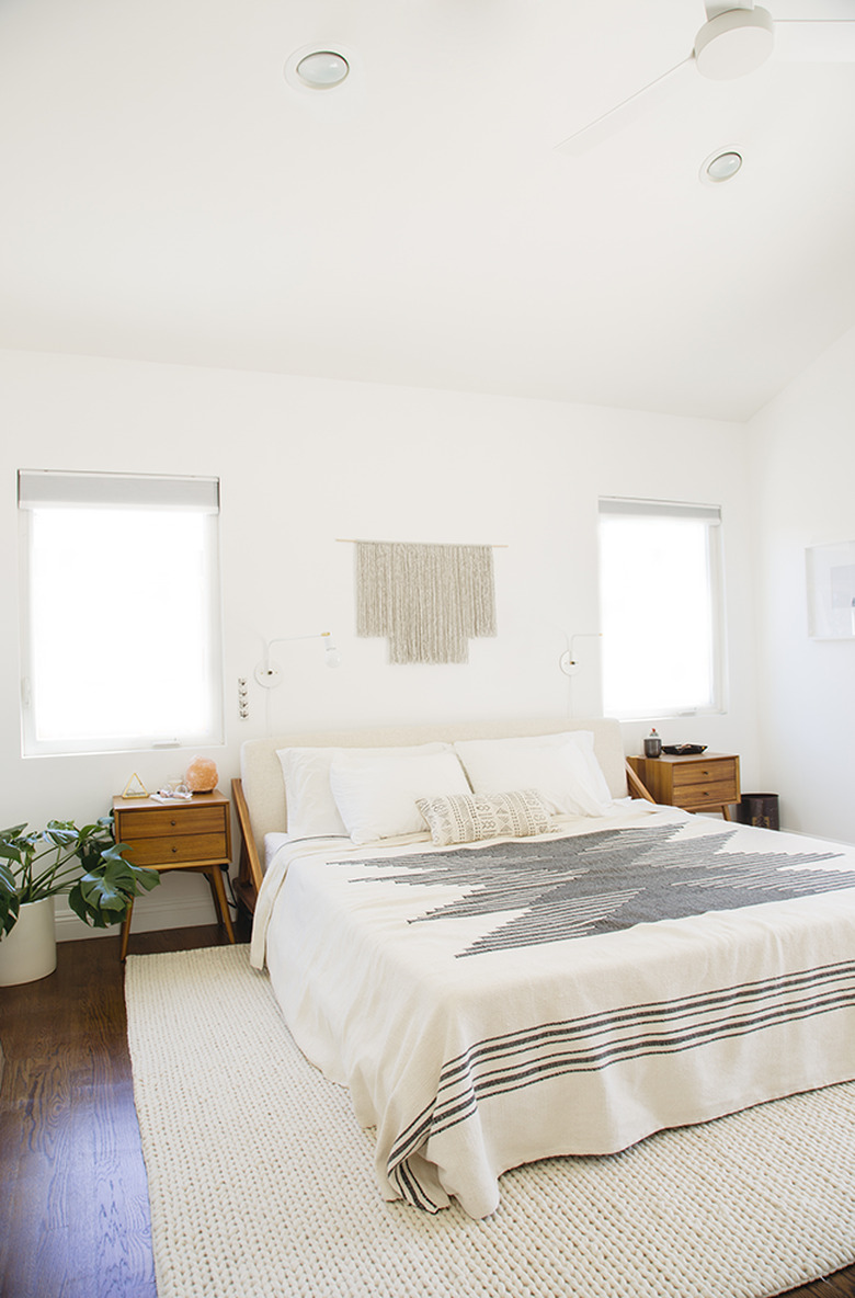 Minimal midcentury bedroom with symmetrical side tables