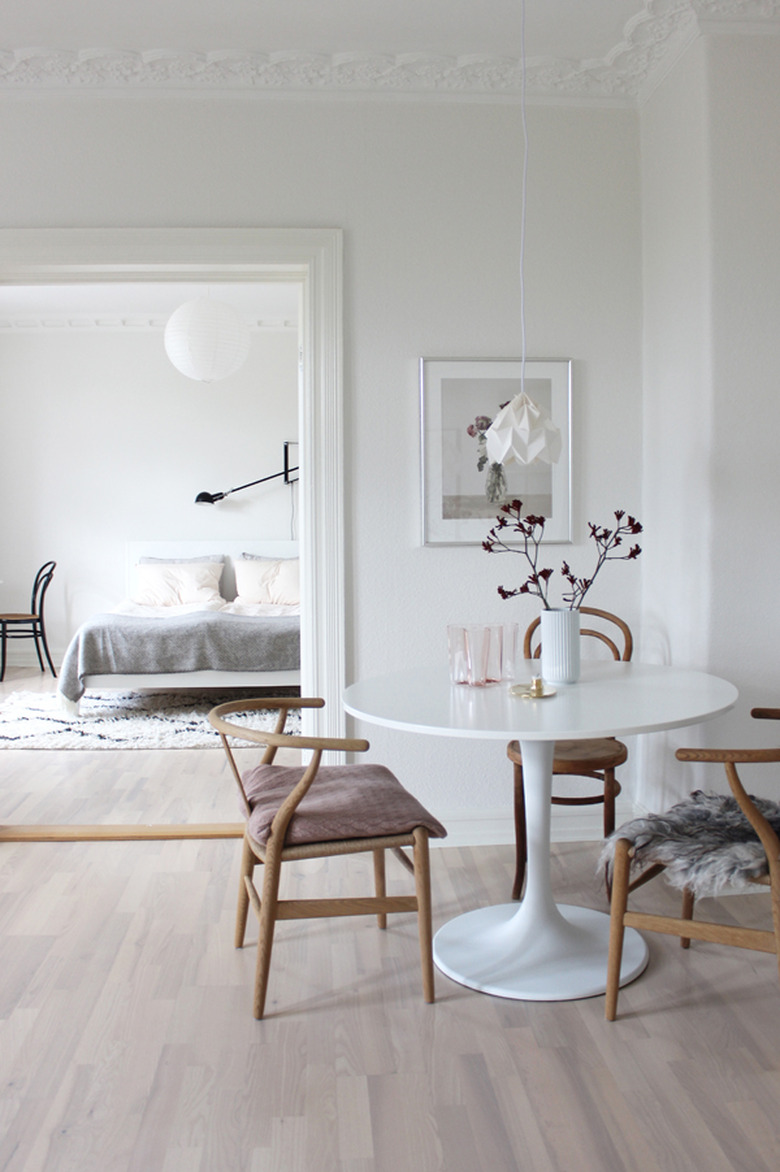 Scandinavian dining room with sheepskin seat cover