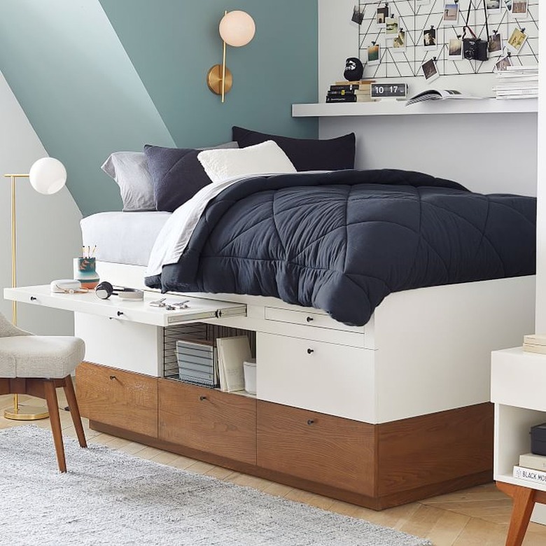 small bedroom storage idea: captain's bed with pull-out desk