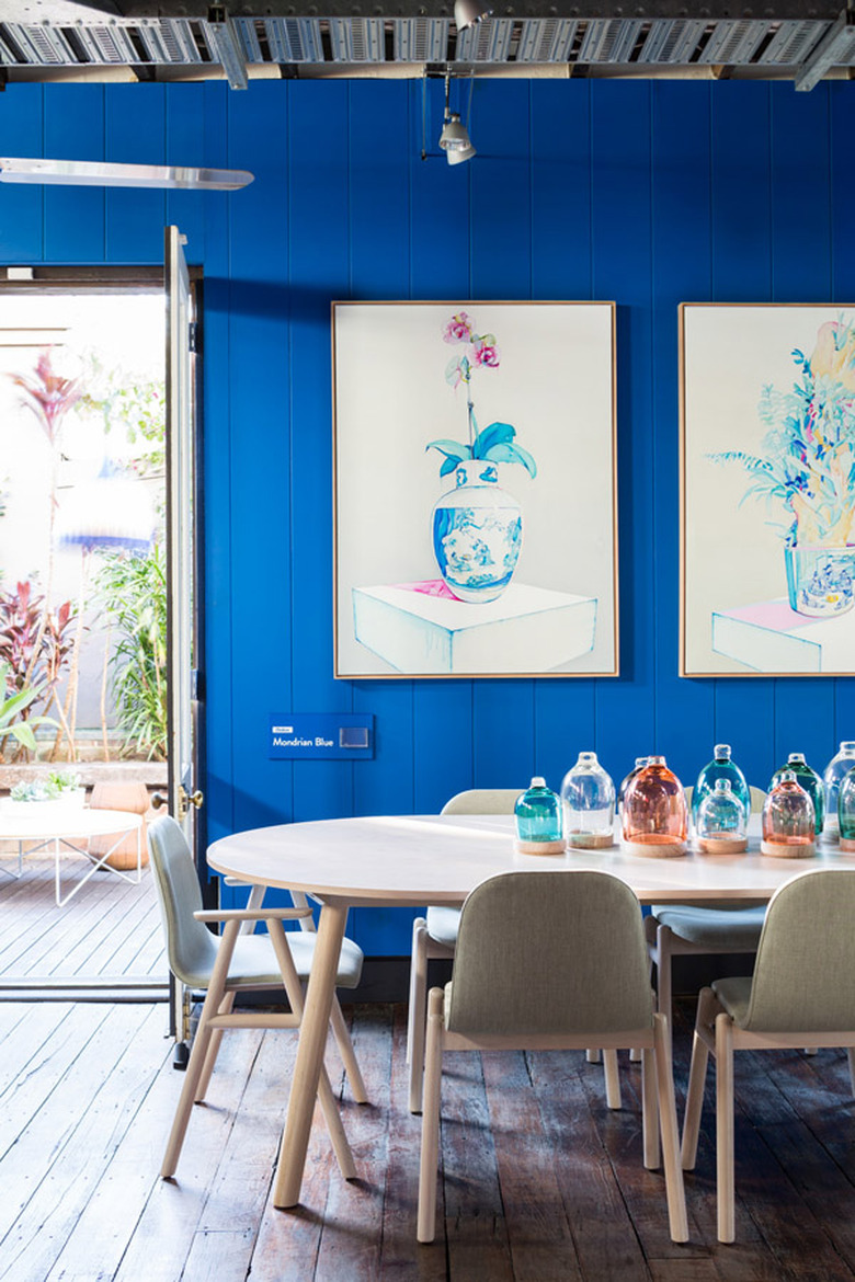 bright blue sunroom dining room