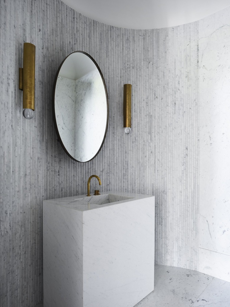 gray bathroom with linear marble tile