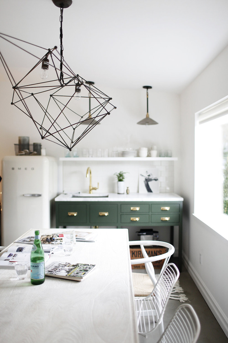 custom green kitchen cabinet