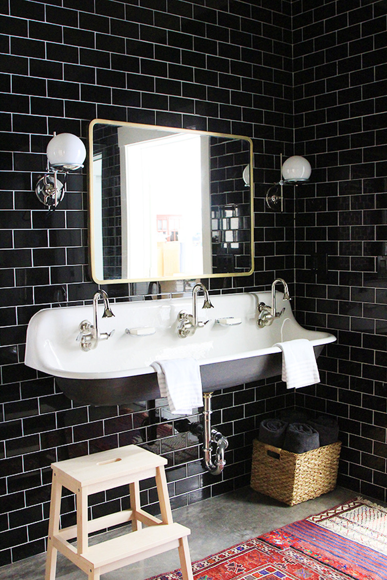 industrial bohemian bathroom with trough sink