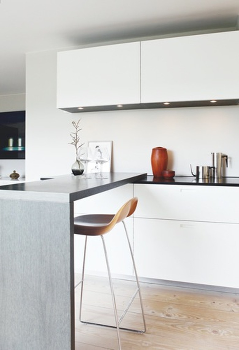 crate and barrel counter stool in minimalist Scandinavian kitchen