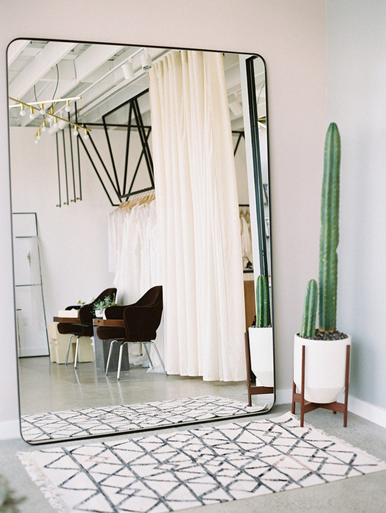 oversized leaning wardrobe mirror