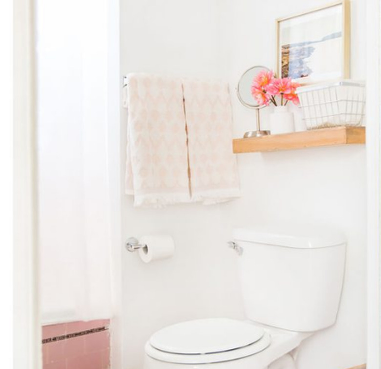 floating shelves in bathroom.