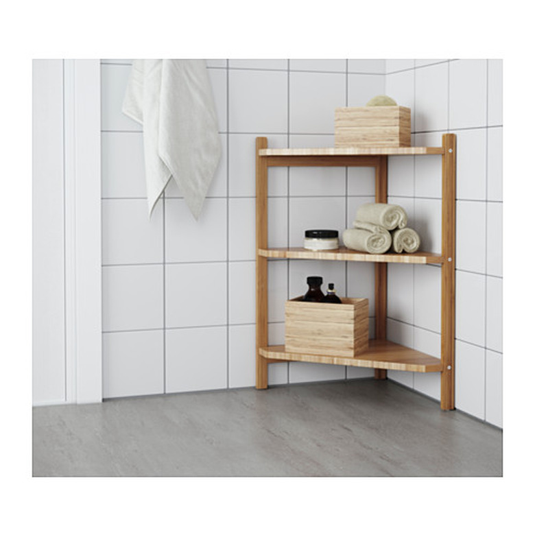 corner shelf by Ikea in bathroom.