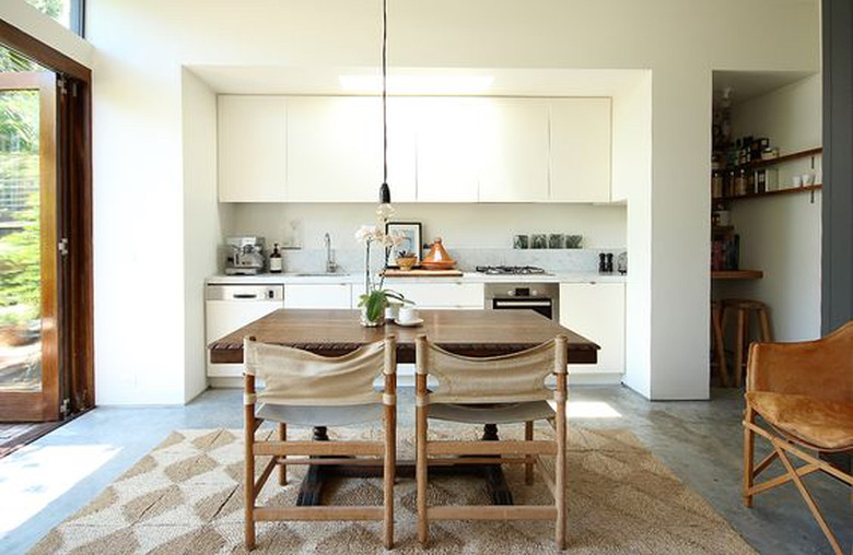 modern kitchen with concrete flooring