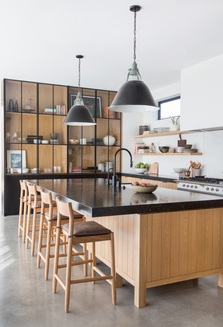 concrete kitchen floors in modern kitchen with black accents and light wood