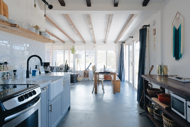 modern rustic dining room with wooden beams