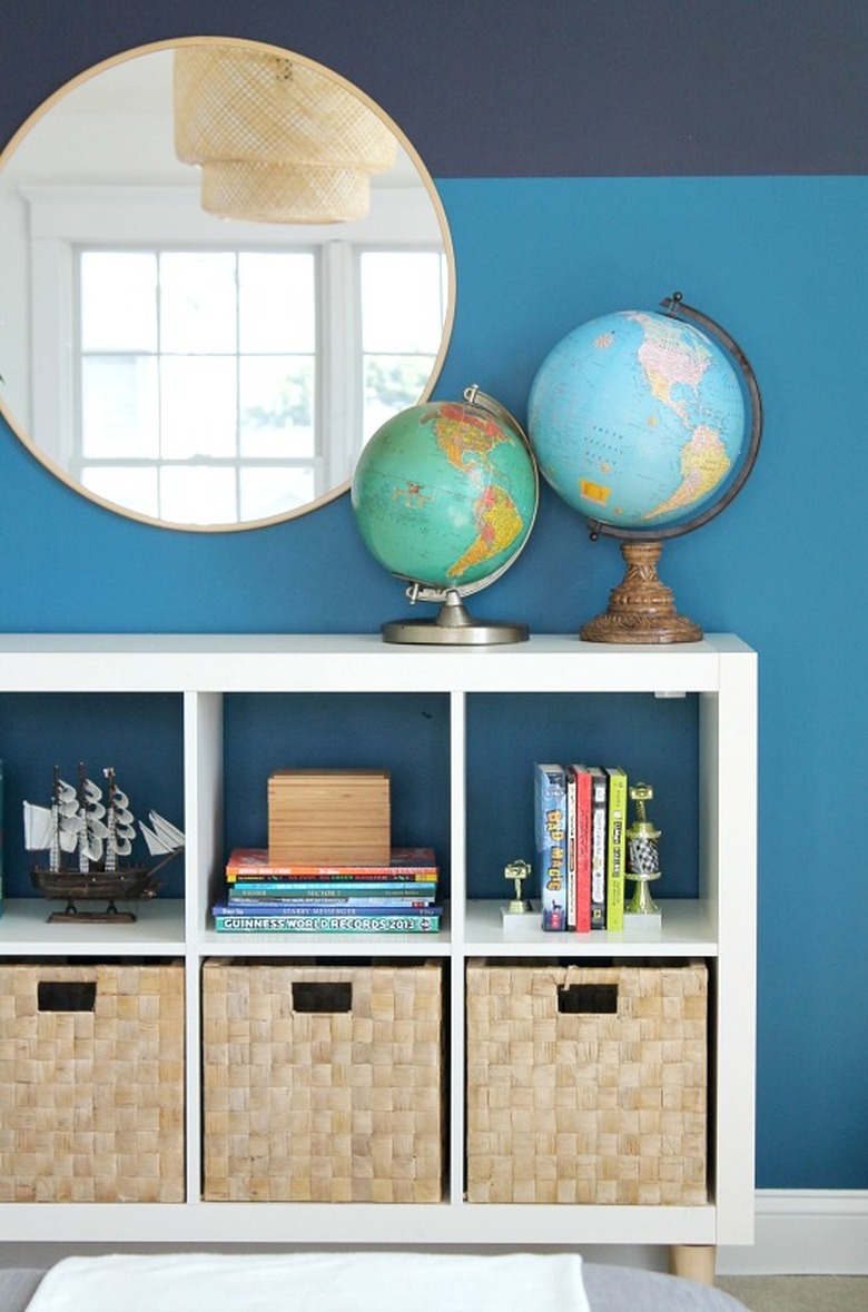 Stripes of blue accent a bookshelf