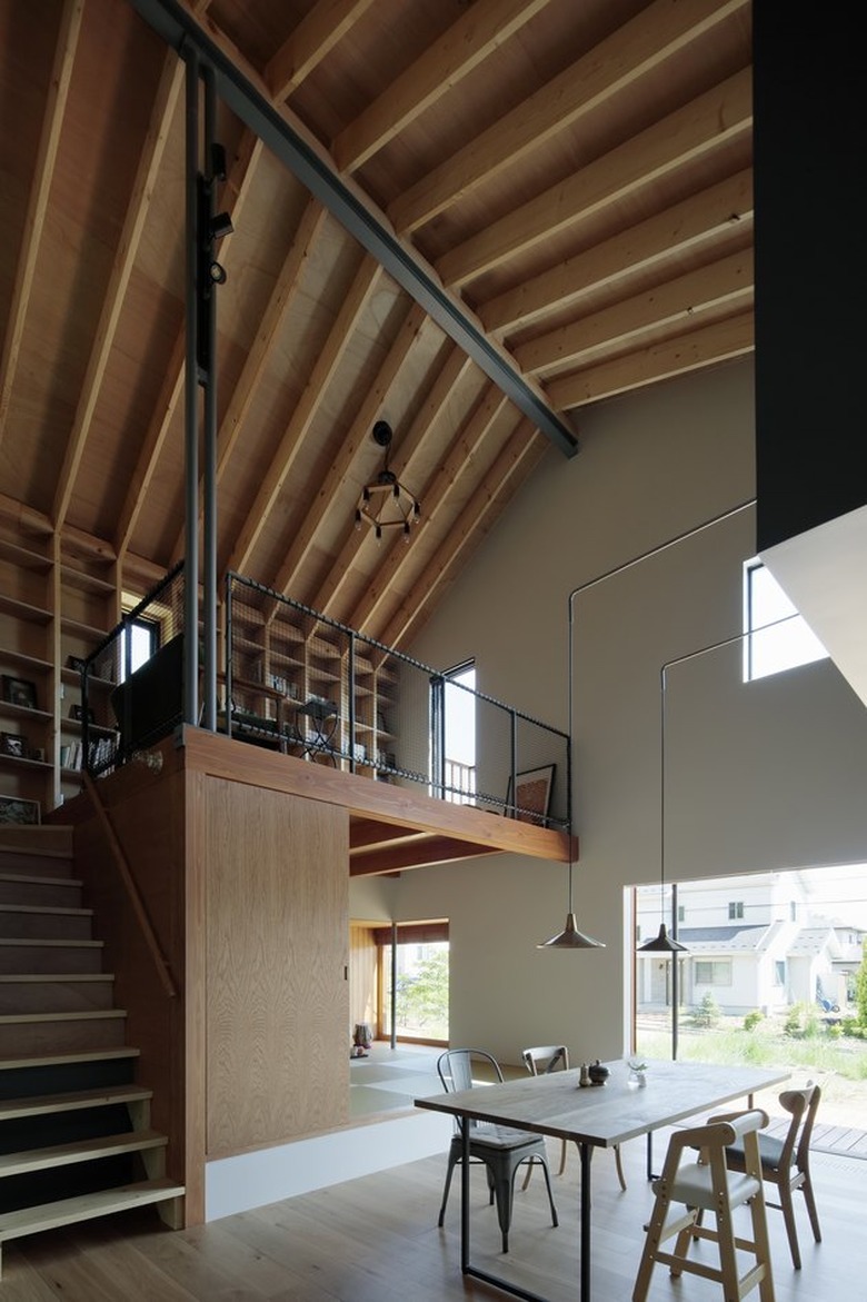 open concept living dining plus a loft office space in Japanese cabin