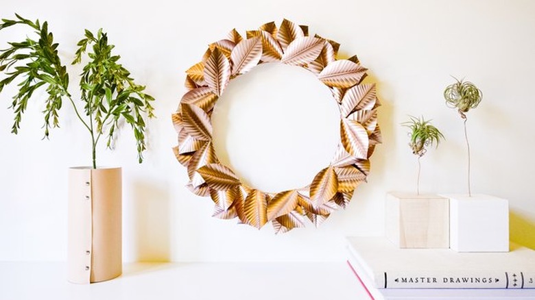 rose gold painted leaves make up this festive fall wreath