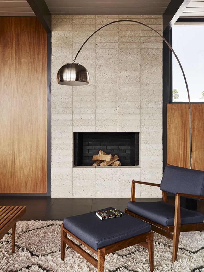 classic midcentury cinder block fireplace with Danish chair and coffee table