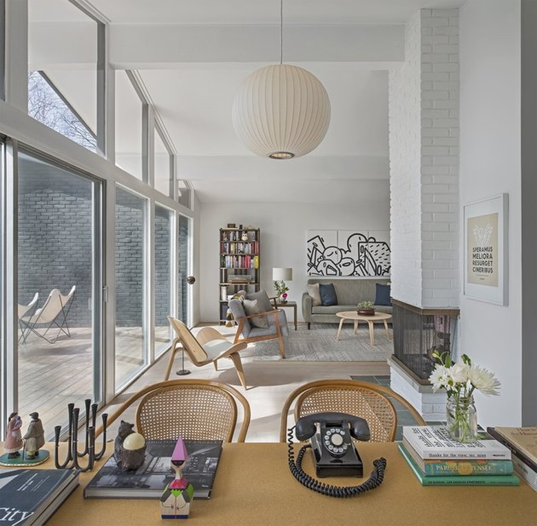 midcentury living room with floor-to-ceiling windows