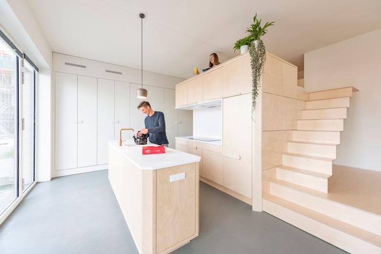 plywood kitchen in open-concept loft design