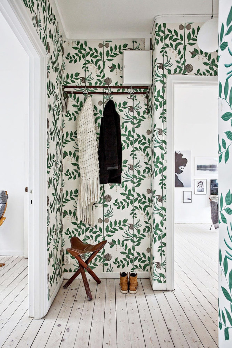 Hallway with botanical green wallpaper