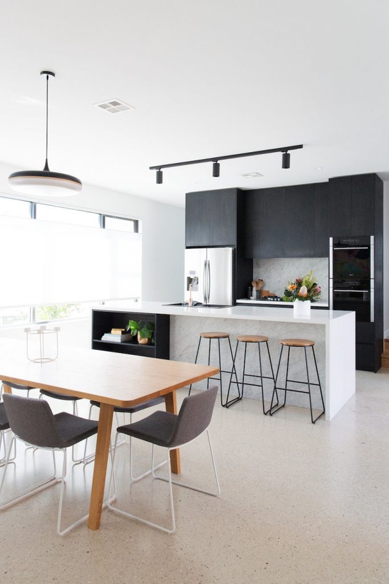 Kitchen lighting idea with track lighting and black cabinets