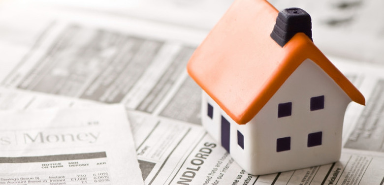 ceramic house landlord in newspaper