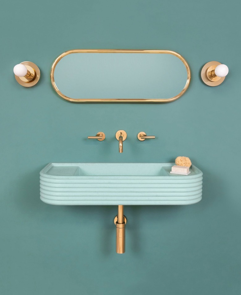 Turqoise bathroom sink idea with brass fixtures