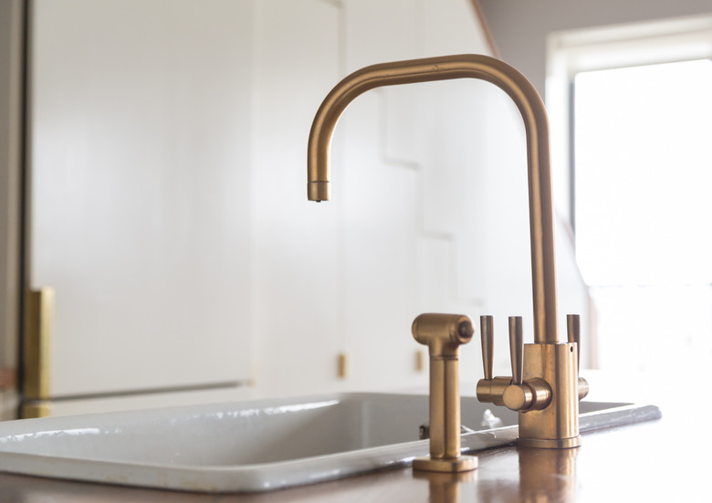 Brass kitchen faucet