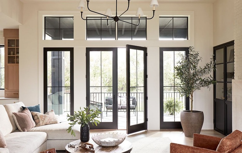 A row of French doors in a spacious living room