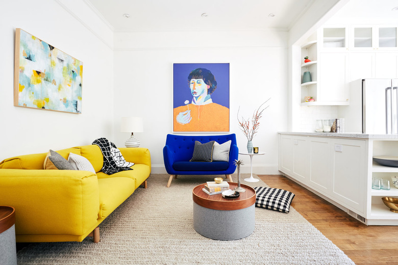 colorful living room with yellow couch