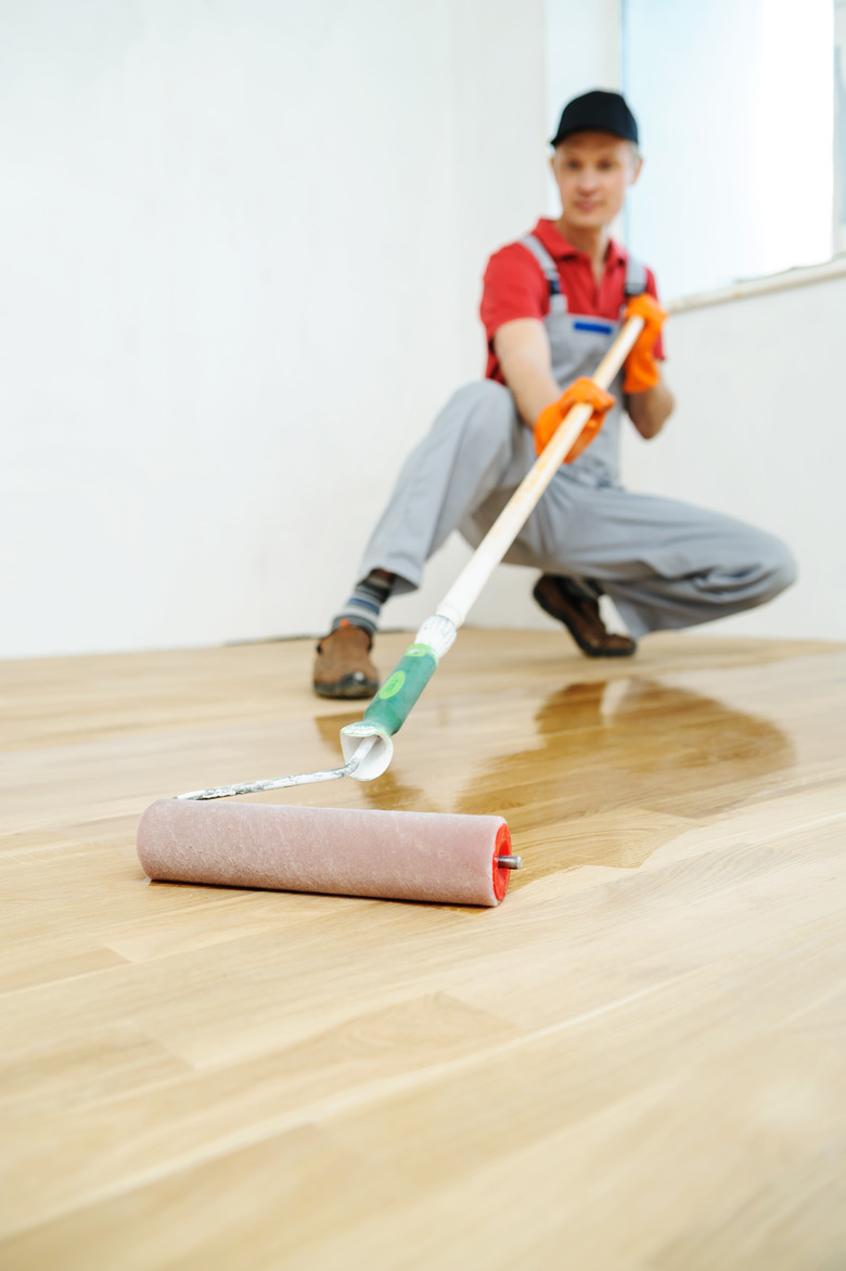 Lacquering wood floors.