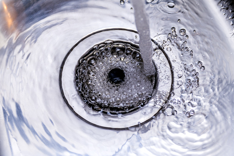 Kitchen sink with running water