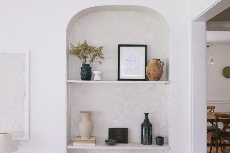 Built-in shelving area with Roman Clay on walls