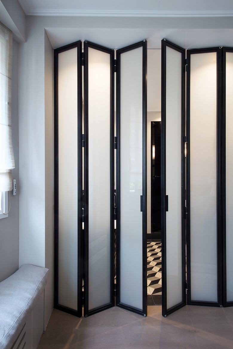 Black and white accordion doors.