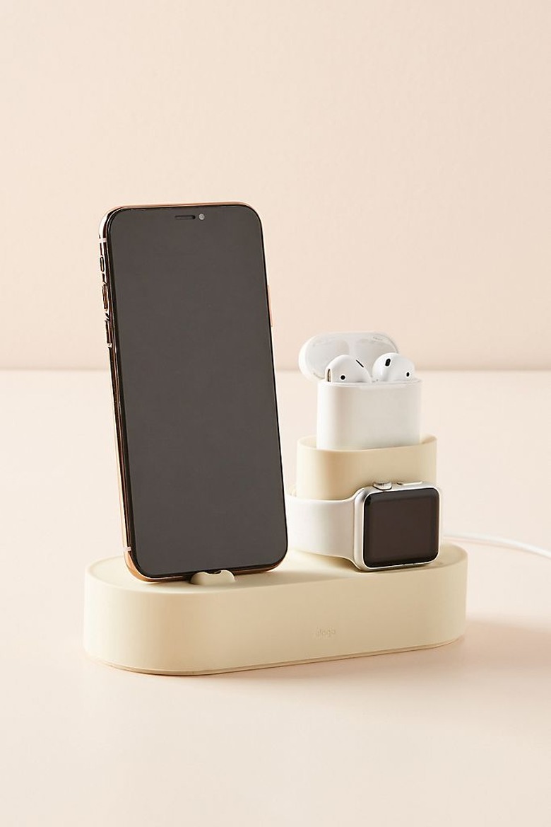 charging station with phone, watch, and headphones