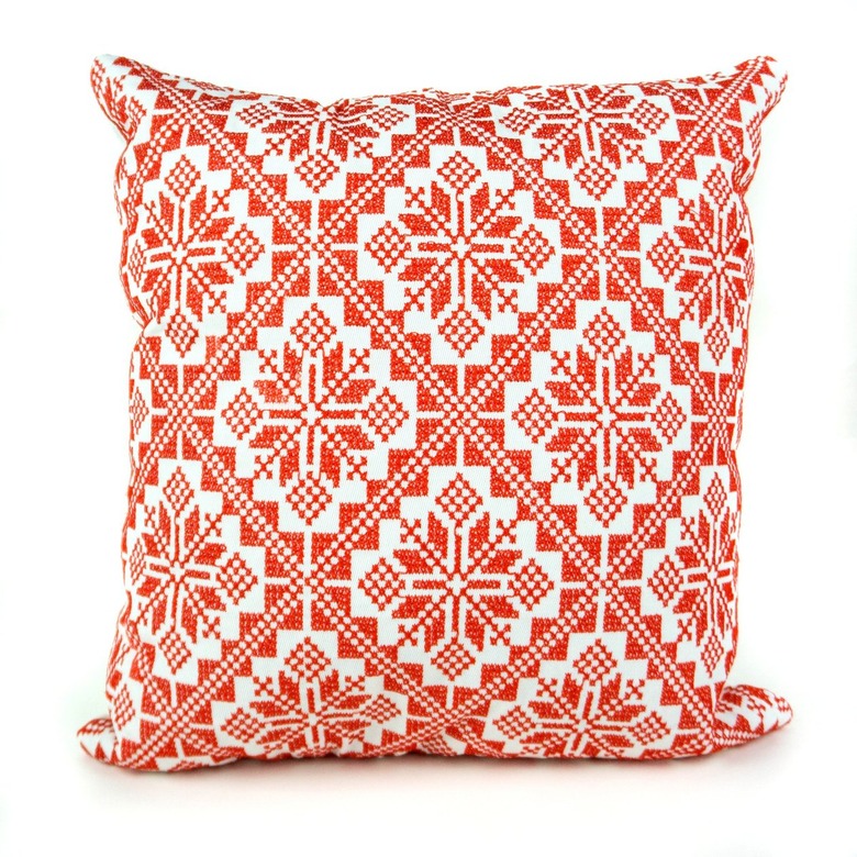 red and white patterned pillow