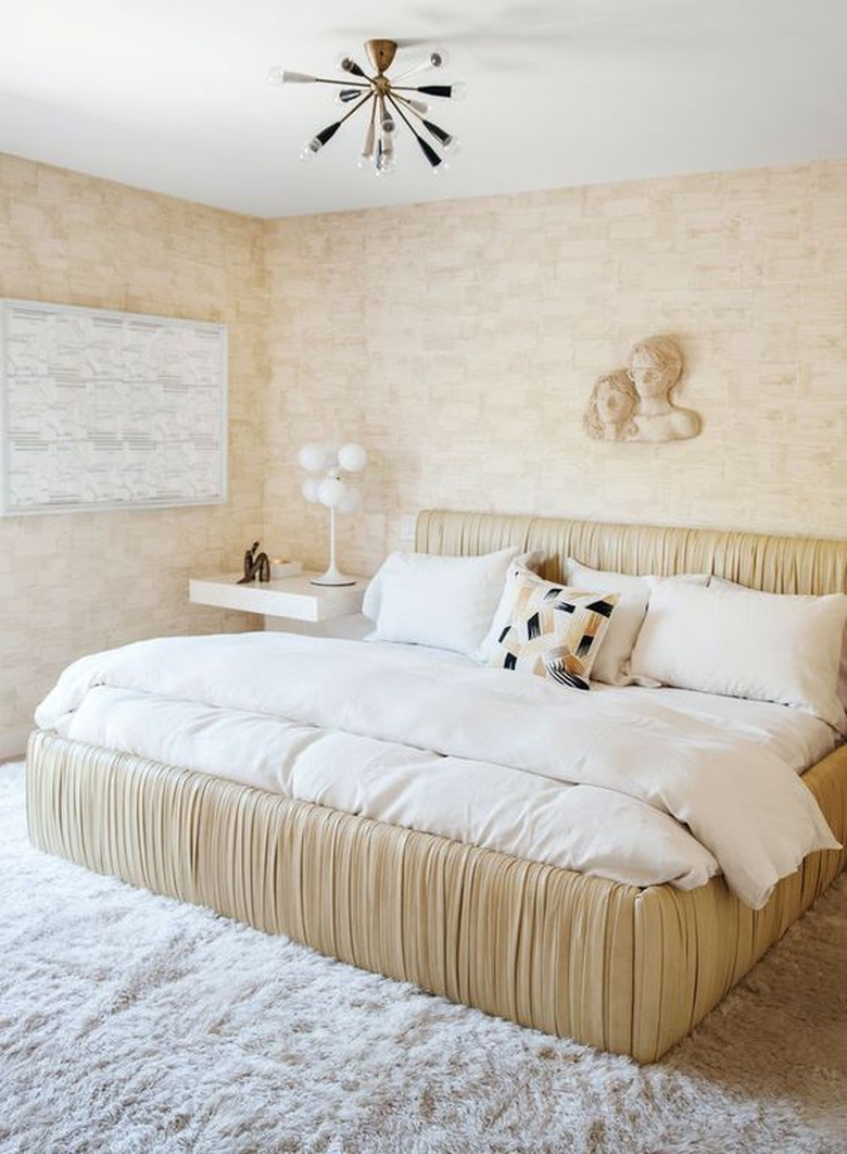 neutral art deco bedroom idea ruched leather bed