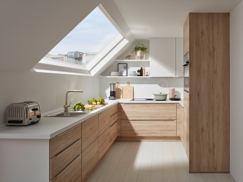 white attic kitchen and big skylight