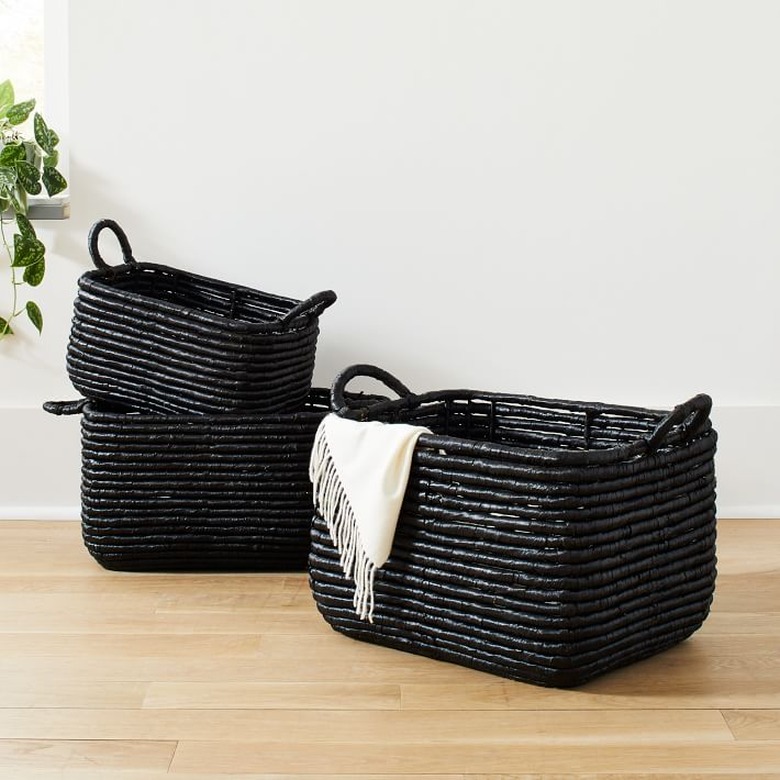 West Elm Woven Seagrass Baskets on light wood floor