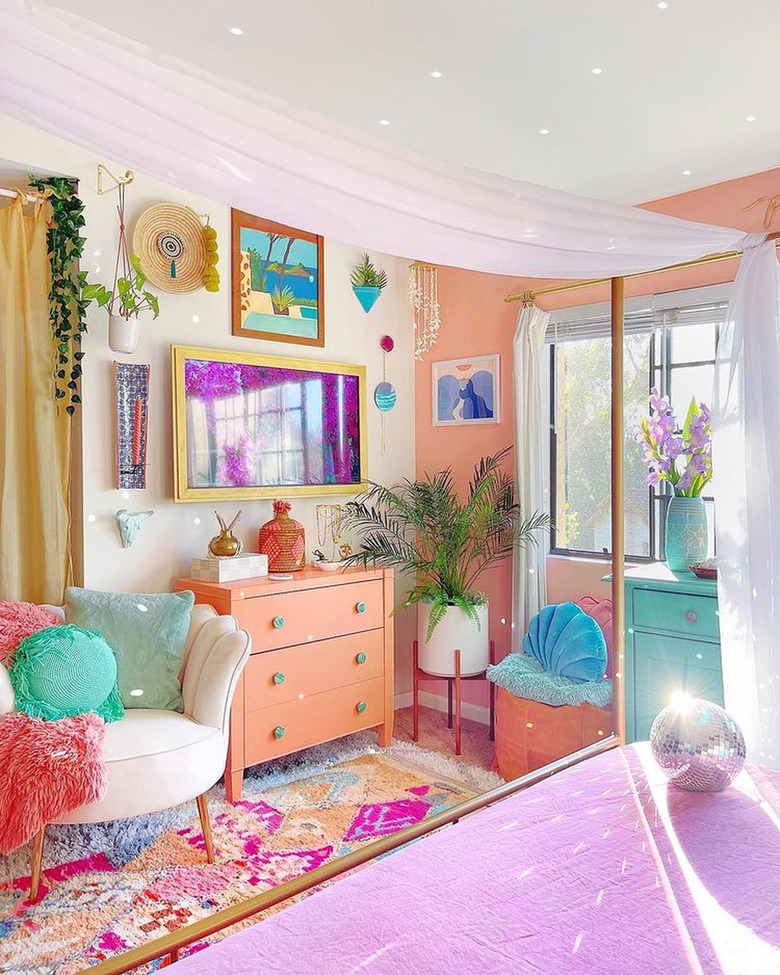 Colorful room with ocean-themed decor and a disco ball