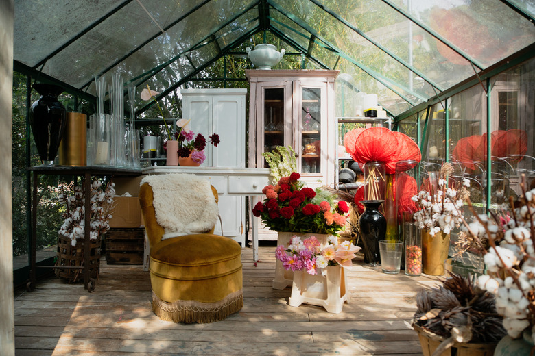 Green house full of flowers in bloom