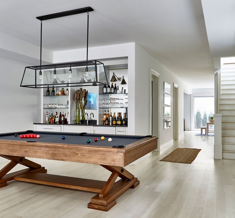 Basement with pool table and bar