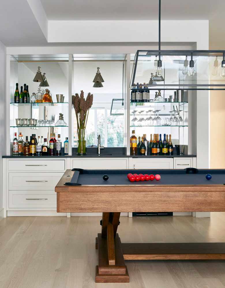 basement wall ideas with bar shelves and pool table