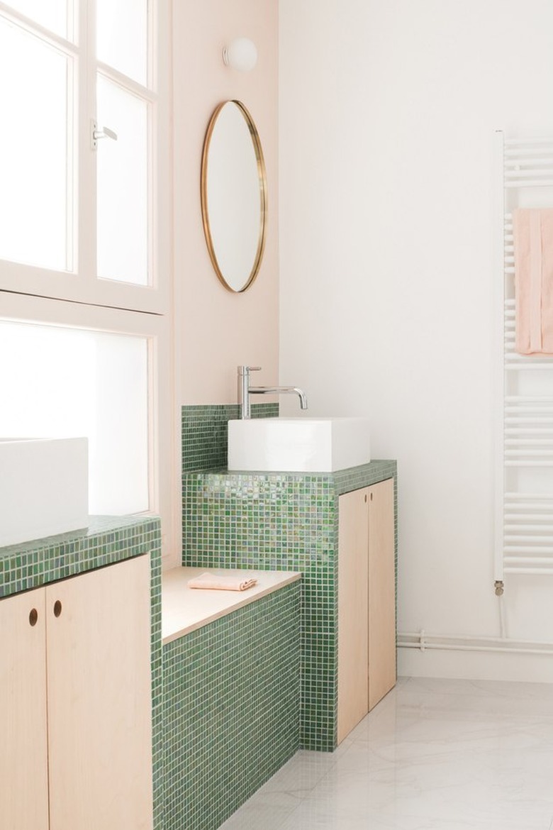 contemporary bathroom with green tile countertop