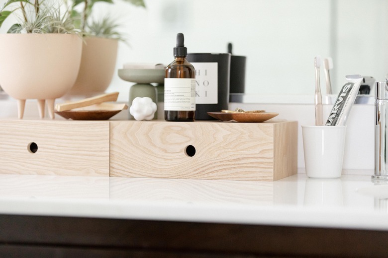 bathroom idea with wooden countertop storage