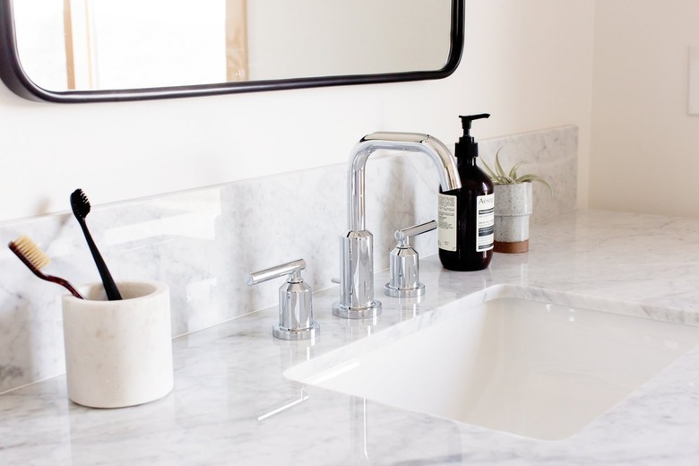 toothbrush holder on bathroom counter