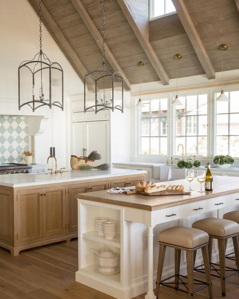 neutral beadboard kitchen island with wood countertop