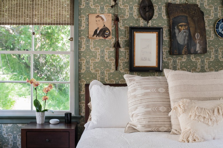 Bedroom with green vintage-style wallpaper