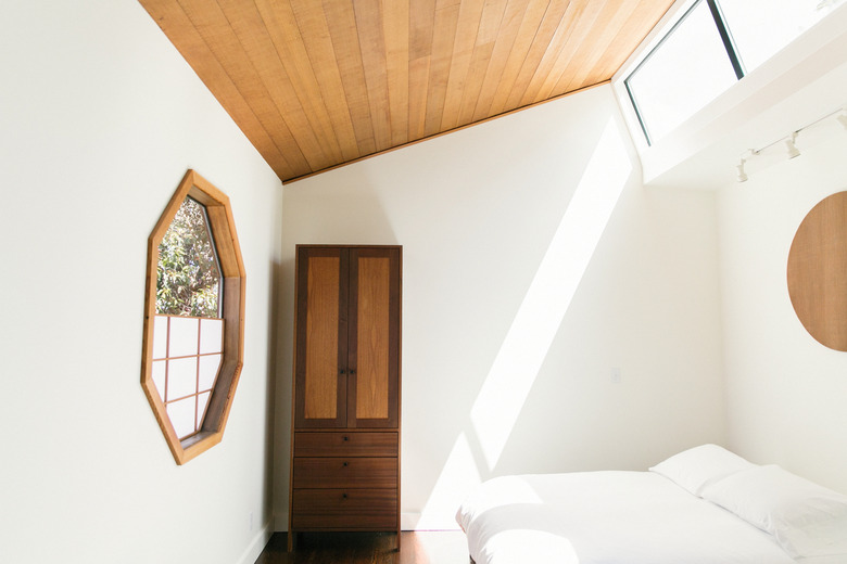 Minimalist Bedroom with high ceiling