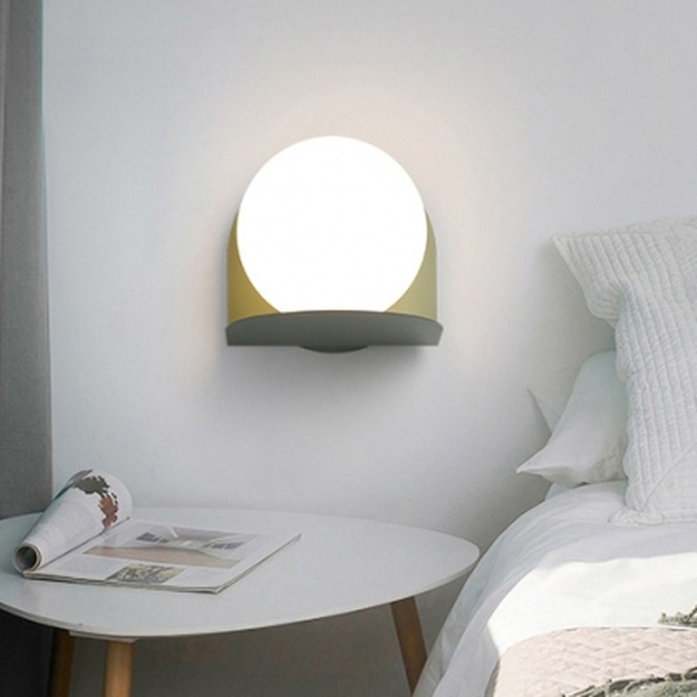 Milky Glass Orb bedroom wall sconce by Beautiful Halo